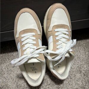 Tan and white sneakers